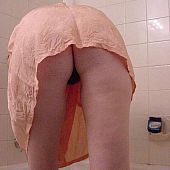 Door peeing bathroom girl.