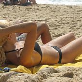 A hotty next door posing at the Ipanema.