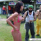 Lovely cuties getting naked at public event.
