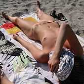 In nature's garb  topless beach cuties receive caught on camera.