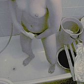 Dilettante voyeur shots from a shower.